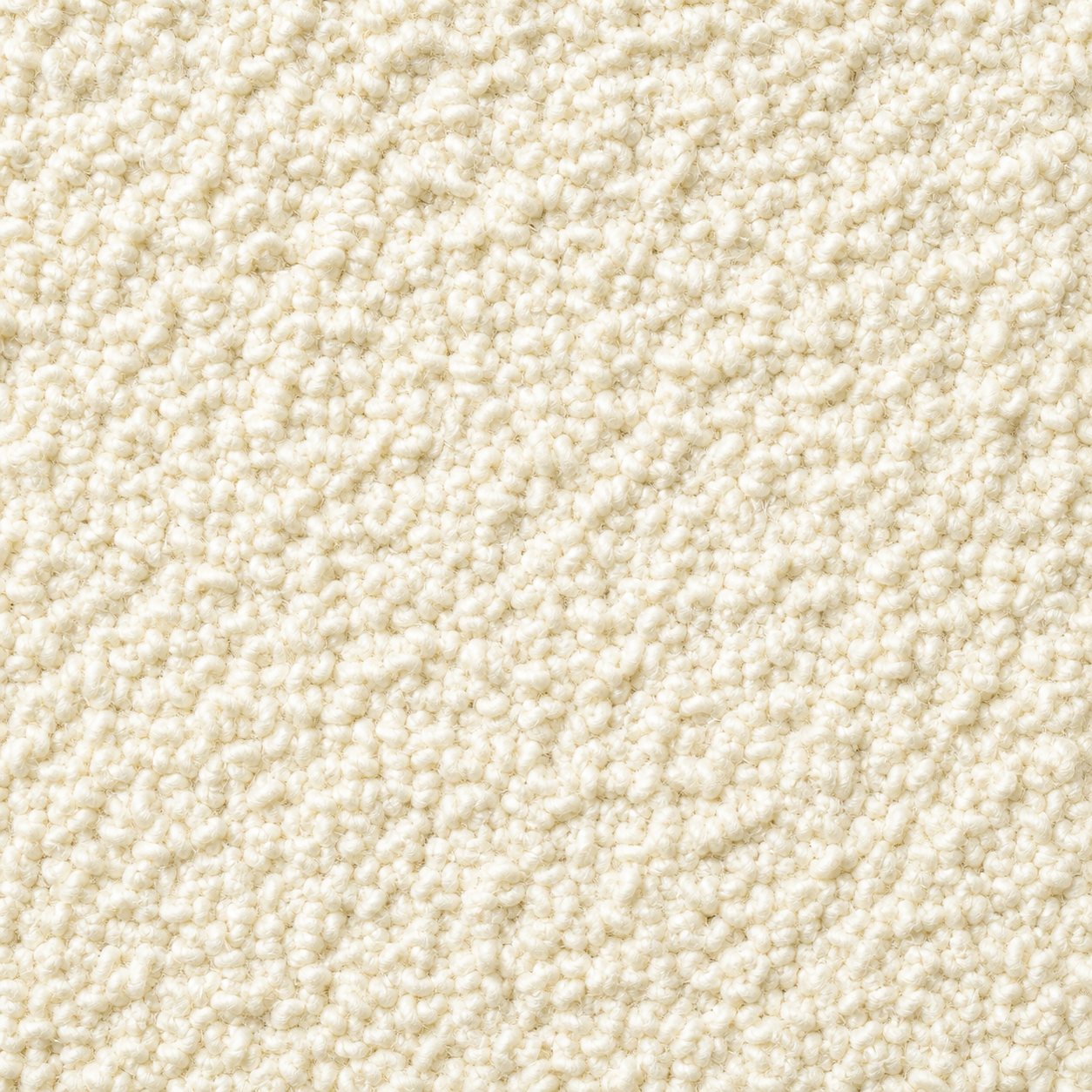 Close-up of ivory bouclé upholstery fabric